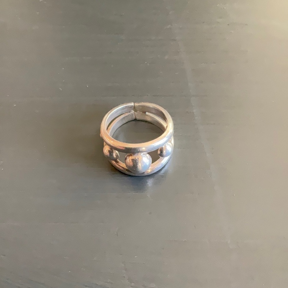 Sterling silver, plait shank ring.